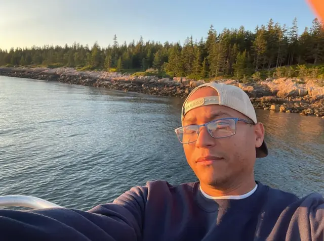 Bryan Green on coastal waters under golden evening light in the Florida Panhandle